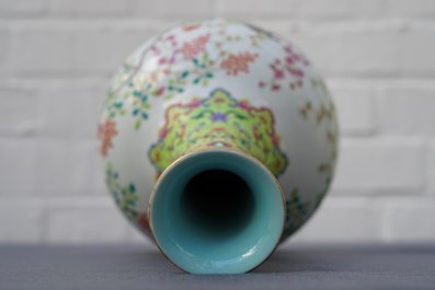 A Chinese famille rose bottle vase with floral design, Jiaqing mark, 19/20th C.